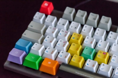 Computer keyboards are often created from acrylonitrile butadiene styrene, which is a low surface energy plastic.