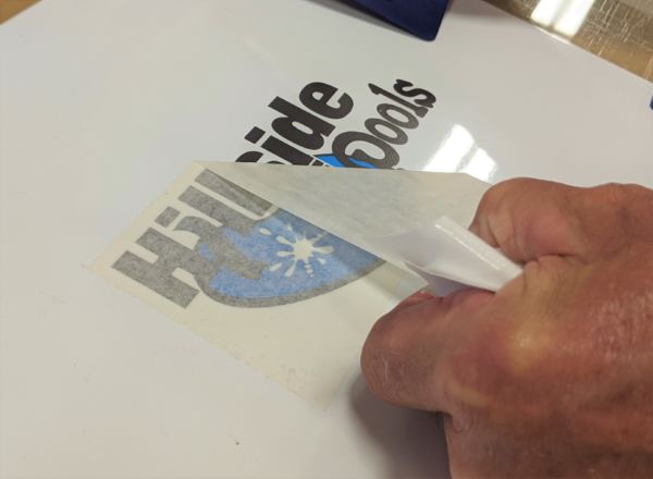 Peeling Premask Tape from a Pre-spaced Vinyl Decal